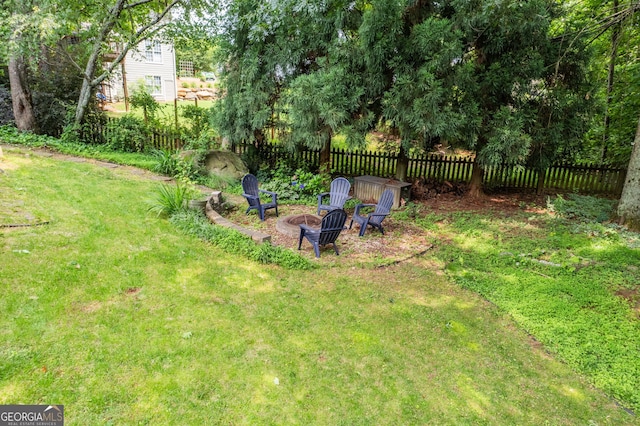 635 Piping Rock Pt, Lawrenceville, GA 30043 - view of yard featuring a fire pit