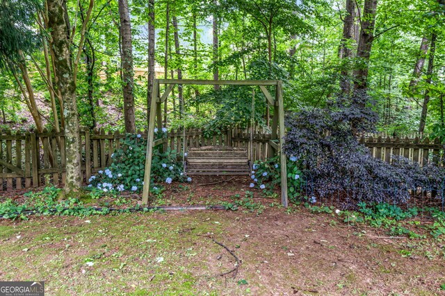 635 Piping Rock Pt, Lawrenceville, GA 30043 - view of fenced yard