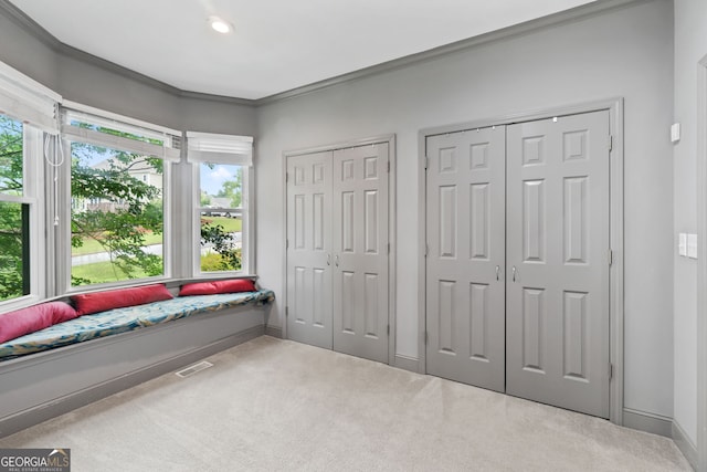 635 Piping Rock Pt, Lawrenceville, GA 30043 - living area featuring carpet floors, healthy amount of natural light, baseboards, crown molding, and recessed lighting