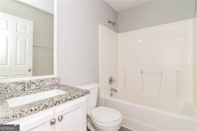 5229 Kirk Dr, Atlanta, GA 30349 - full bath with vanity, toilet, and tub / shower combination