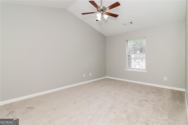 5229 Kirk Dr, Atlanta, GA 30349 - unfurnished room featuring carpet floors, a ceiling fan, vaulted ceiling, and baseboards