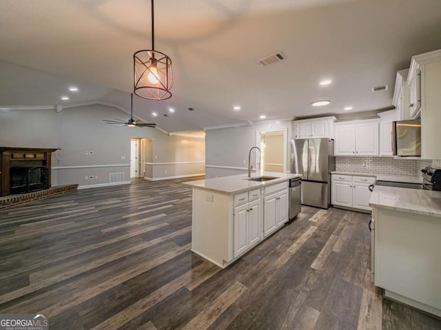 34 Alan Ln Unit 7, Tifton, GA 31793 - kitchen featuring a sink, appliances with stainless steel finishes, a ceiling fan, dark wood finished floors, and white cabinetry