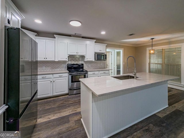 34 Alan Ln Unit 7, Tifton, GA 31793 - kitchen featuring freestanding refrigerator, stainless steel microwave, range with electric stovetop, a sink, and crown molding