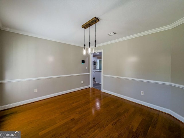 34 Alan Ln Unit 7, Tifton, GA 31793 - spare room with wood finished floors, baseboards, and ornamental molding