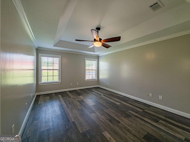 34 Alan Ln Unit 7, Tifton, GA 31793 - empty room with ornamental molding, baseboards, a raised ceiling, dark wood finished floors, and ceiling fan
