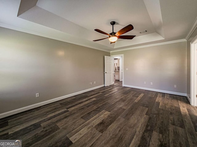 34 Alan Ln Unit 7, Tifton, GA 31793 - unfurnished room with a raised ceiling, a ceiling fan, dark wood-type flooring, baseboards, and crown molding