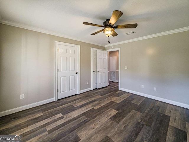 34 Alan Ln Unit 7, Tifton, GA 31793 - unfurnished bedroom featuring dark wood-style flooring, baseboards, crown molding, and a ceiling fan