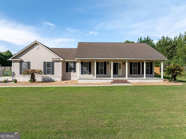 34 Alan Ln Unit 7, Tifton, GA 31793 - view of front facade featuring covered porch, a front yard, and a shingled roof