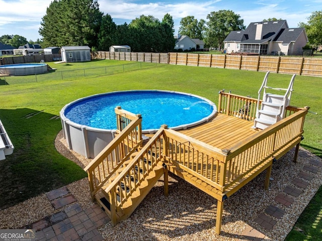 34 Alan Ln Unit 7, Tifton, GA 31793 - view of swimming pool featuring a deck
