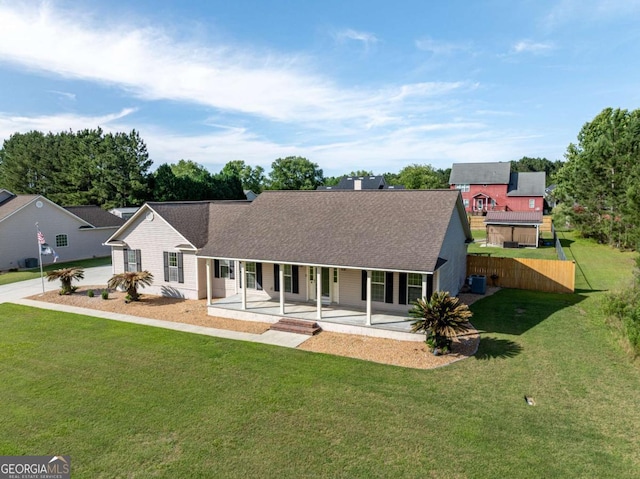 34 Alan Ln Unit 7, Tifton, GA 31793 - view of front of property featuring covered porch, a front lawn, and a shingled roof