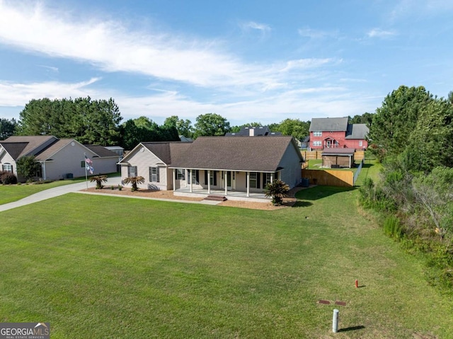 34 Alan Ln Unit 7, Tifton, GA 31793 - single story home with covered porch, concrete driveway, and a front lawn