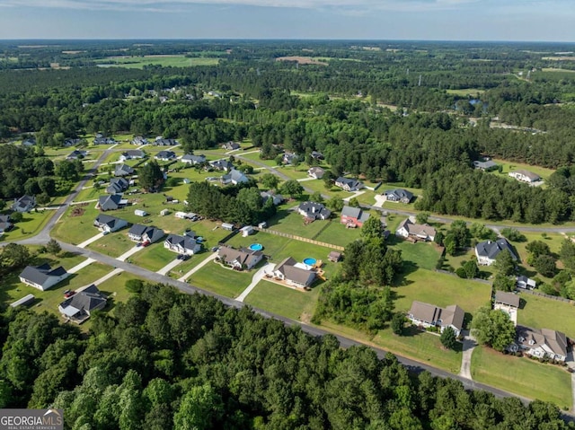 34 Alan Ln Unit 7, Tifton, GA 31793 - aerial overview of property's location with a heavily wooded area