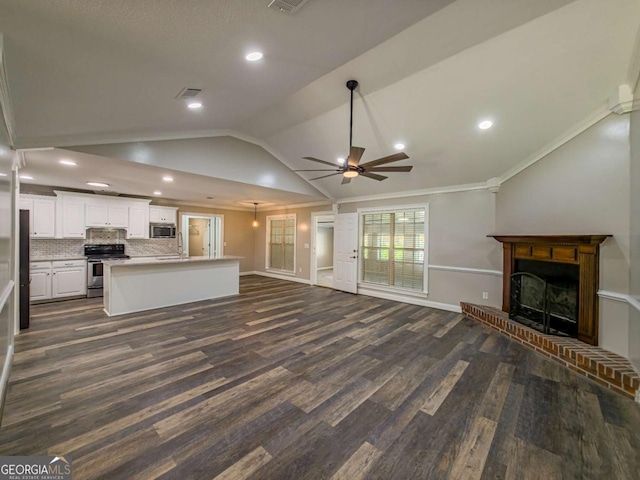 34 Alan Ln Unit 7, Tifton, GA 31793 - unfurnished living room with vaulted ceiling, a ceiling fan, ornamental molding, dark wood finished floors, and a sink