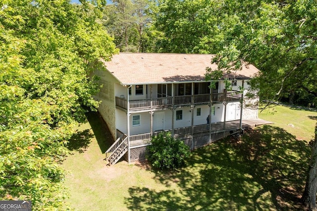 156 Spoon Hill Dr, Hayesville, NC 28904 - rear view of house featuring a lawn, a balcony, covered porch, a shingled roof, and stairway