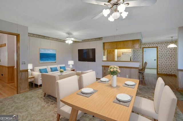 156 Spoon Hill Dr, Hayesville, NC 28904 - dining room featuring wood finished floors, a ceiling fan, and wallpapered walls