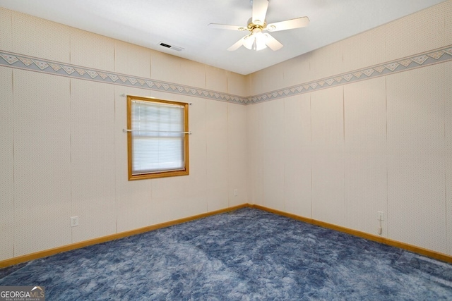 156 Spoon Hill Dr, Hayesville, NC 28904 - spare room with ceiling fan, dark colored carpet, and baseboards