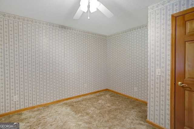 156 Spoon Hill Dr, Hayesville, NC 28904 - spare room featuring a ceiling fan, carpet, and baseboards