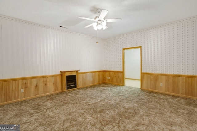 156 Spoon Hill Dr, Hayesville, NC 28904 - empty room featuring ceiling fan, wainscoting, and carpet