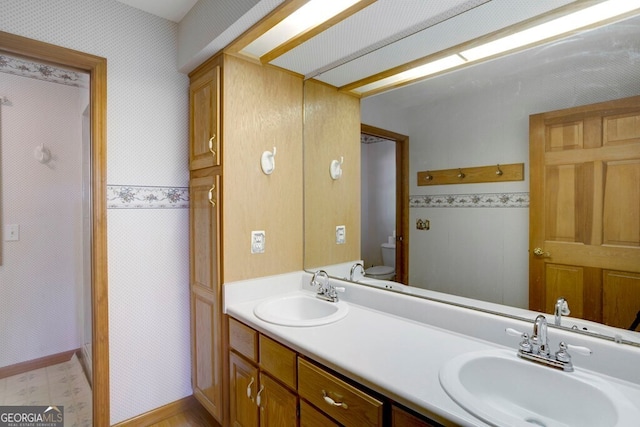 156 Spoon Hill Dr, Hayesville, NC 28904 - full bathroom with toilet, double vanity, and tile patterned floors