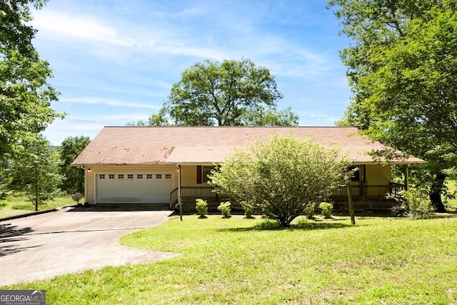156 Spoon Hill Dr, Hayesville, NC 28904 - view of front facade featuring concrete driveway, an attached garage, a front lawn, a porch, and roof with shingles
