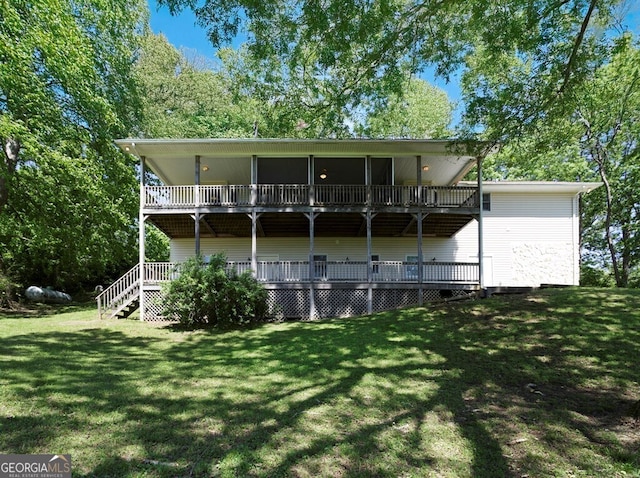 156 Spoon Hill Dr, Hayesville, NC 28904 - back of house featuring a lawn and a wooden deck