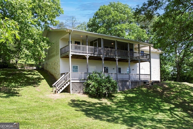 156 Spoon Hill Dr, Hayesville, NC 28904 - back of house with a balcony and a lawn