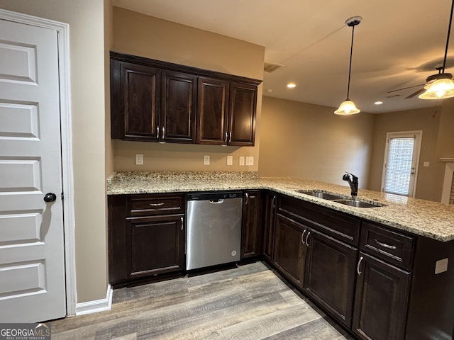 1853 Broad River Rd, Atlanta, GA 30349 - kitchen with dishwasher, a sink, light wood-type flooring, a peninsula, and a ceiling fan