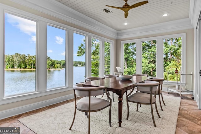 1461 N Shore Dr, Greensboro, GA 30642 - sunroom with a water view, crown molding, baseboards, and view of wooded area