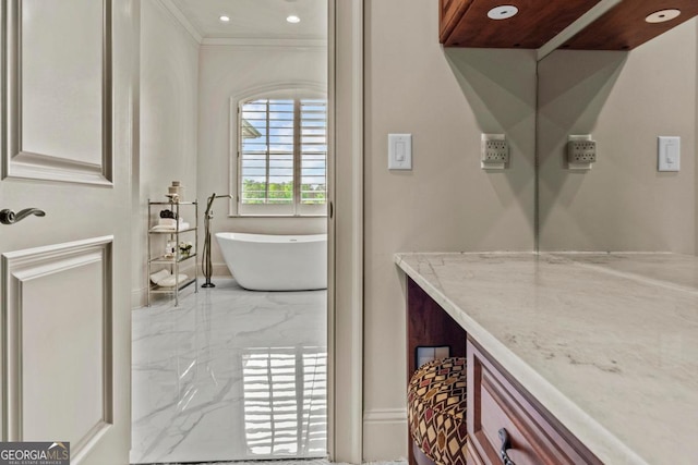 1461 N Shore Dr, Greensboro, GA 30642 - bathroom with marble tiled flooring, a soaking tub, crown molding, vanity, and recessed lighting
