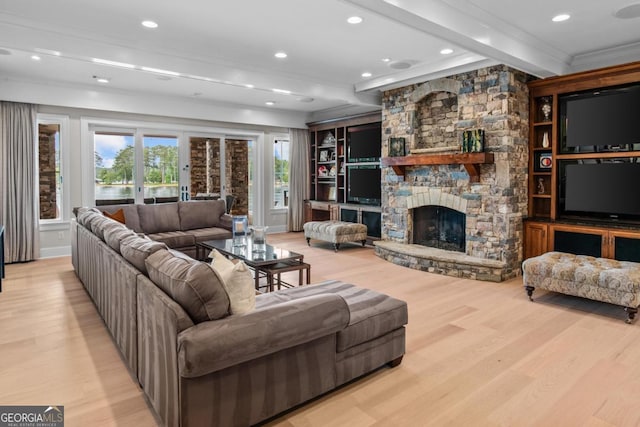 1461 N Shore Dr, Greensboro, GA 30642 - living room featuring crown molding, light wood-style floors, beamed ceiling, recessed lighting, and a stone fireplace