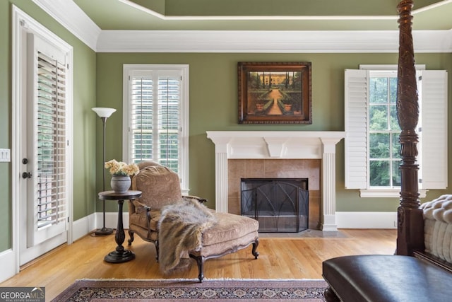 13037 Overlook Pass, Roswell, GA 30075 - living area with wood finished floors, healthy amount of natural light, and ornamental molding