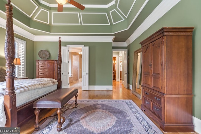 13037 Overlook Pass, Roswell, GA 30075 - bedroom featuring crown molding, light wood-style flooring, baseboards, and connected bathroom