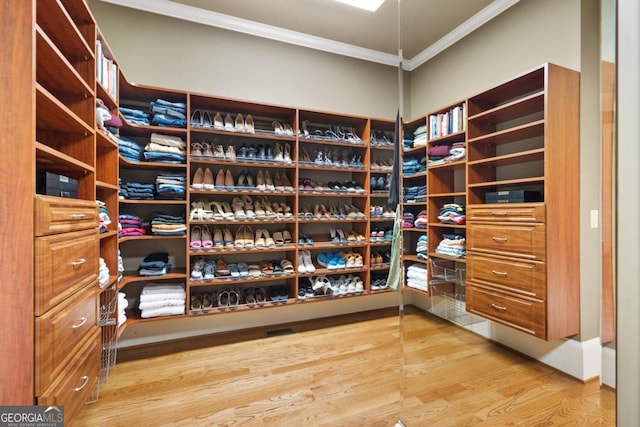 13037 Overlook Pass, Roswell, GA 30075 - walk in closet with light wood-style flooring