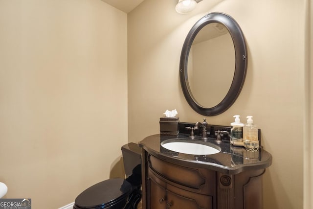 13037 Overlook Pass, Roswell, GA 30075 - bathroom with toilet, vanity, and baseboards
