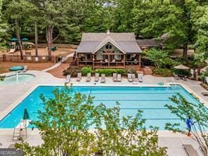 13037 Overlook Pass, Roswell, GA 30075 - community pool with a patio area