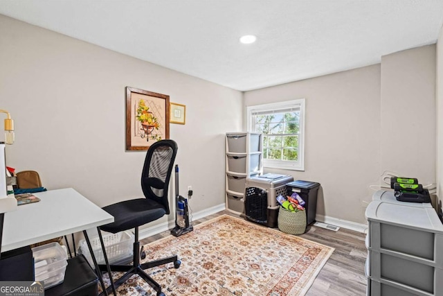 251 Lang St, Griffin, GA 30223 - home office featuring baseboards, wood finished floors, and recessed lighting
