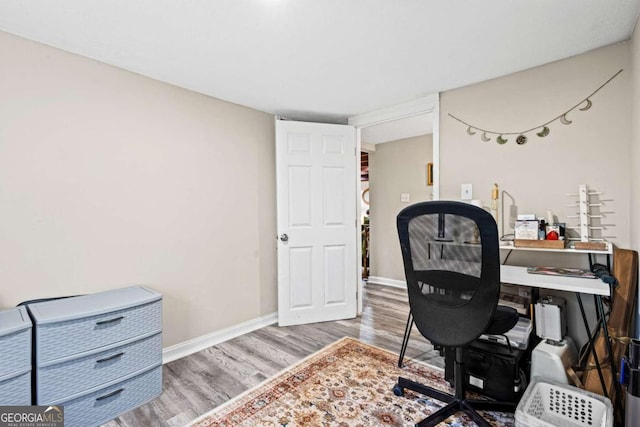 251 Lang St, Griffin, GA 30223 - office area featuring wood finished floors and baseboards