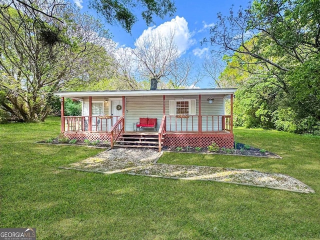 251 Lang St, Griffin, GA 30223 - view of front facade featuring a porch and a front yard