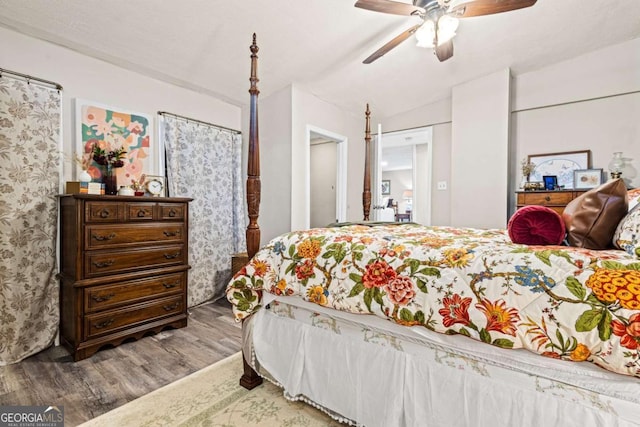 251 Lang St, Griffin, GA 30223 - bedroom with wood finished floors, vaulted ceiling, and ceiling fan