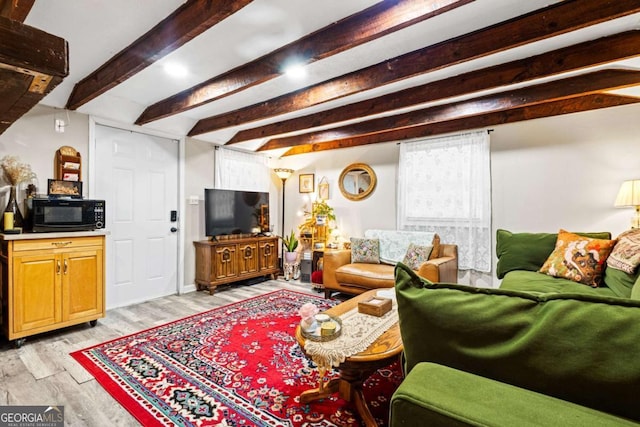 251 Lang St, Griffin, GA 30223 - living area featuring beam ceiling and light wood-type flooring
