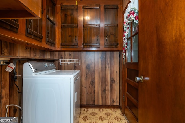 3549 Dogwood Dr, Powder Springs, GA 30127 - laundry room featuring cabinet space and wood walls