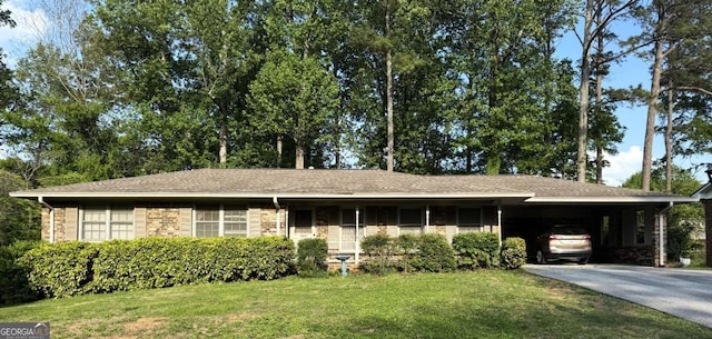 3549 Dogwood Dr, Powder Springs, GA 30127 - ranch-style house with a front yard, asphalt driveway, and an attached carport