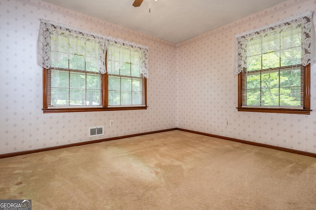 3549 Dogwood Dr, Powder Springs, GA 30127 - carpeted empty room with ceiling fan