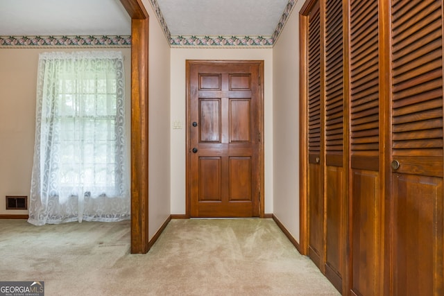 3549 Dogwood Dr, Powder Springs, GA 30127 - entryway with light carpet and baseboards