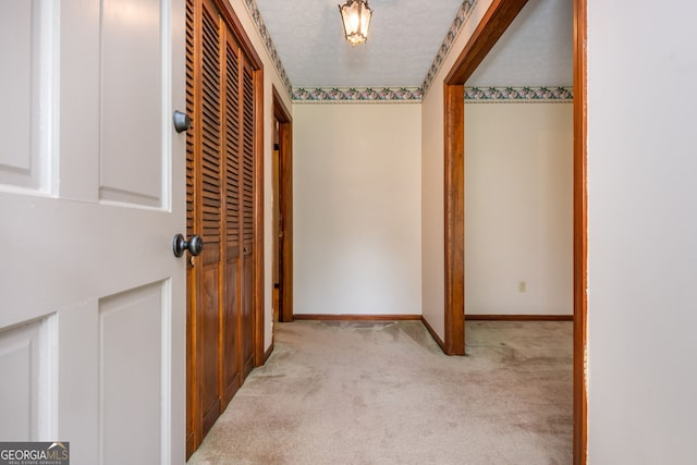 3549 Dogwood Dr, Powder Springs, GA 30127 - hallway featuring light carpet and baseboards