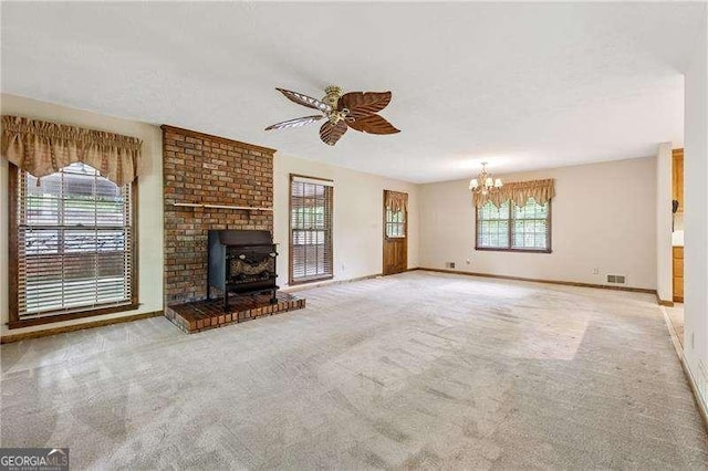 2270 Dinsmore Rd, Alpharetta, GA 30004 - unfurnished living room featuring a chandelier, ceiling fan, carpet, and baseboards