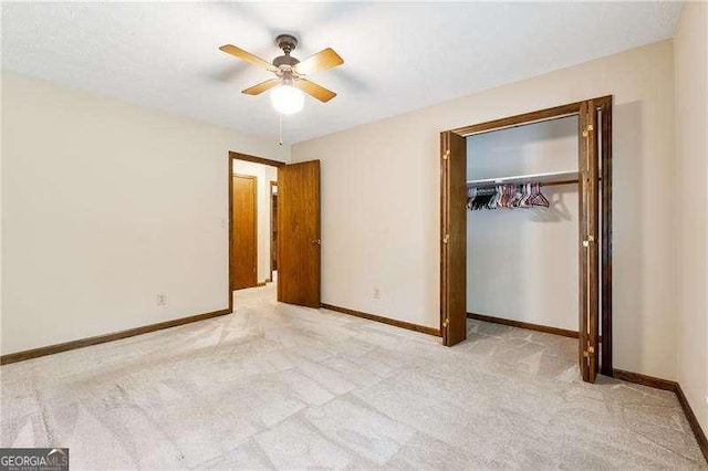 2270 Dinsmore Rd, Alpharetta, GA 30004 - unfurnished bedroom with light carpet, baseboards, a closet, and a ceiling fan