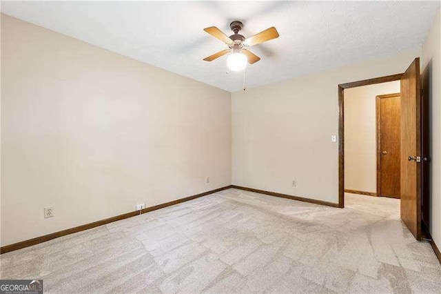 2270 Dinsmore Rd, Alpharetta, GA 30004 - spare room with ceiling fan, light colored carpet, and baseboards