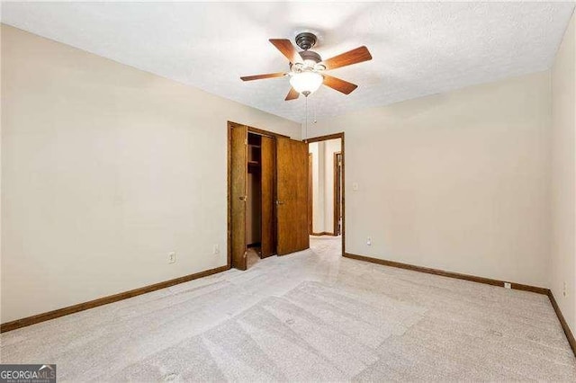 2270 Dinsmore Rd, Alpharetta, GA 30004 - spare room with a ceiling fan, light colored carpet, and baseboards