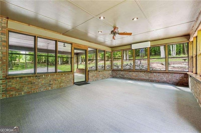 2270 Dinsmore Rd, Alpharetta, GA 30004 - unfurnished sunroom featuring brick wall, a ceiling fan, and healthy amount of natural light